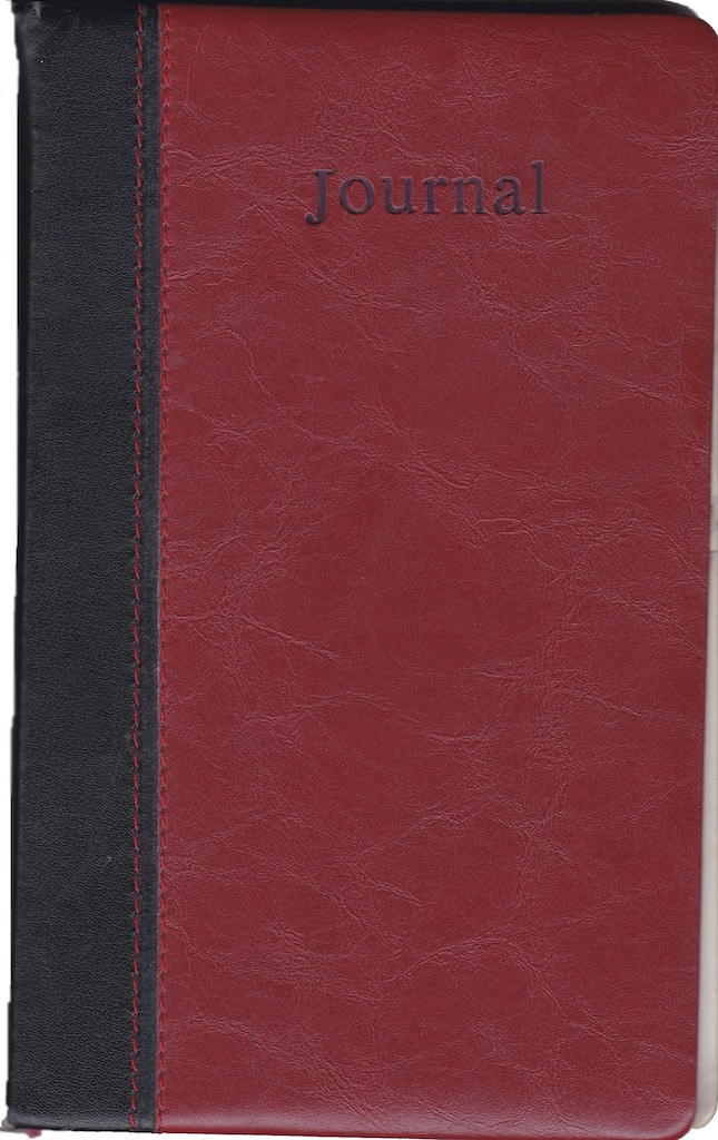 Red journal cover with black binding